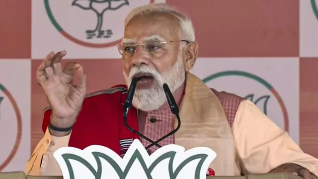 असम चुनाव 2026, पीएम मोदी असम रैली, BJP hattrick Assam, Narendra Modi speech Assam, Rahul Gandhi criticism Modi, Assam election rally news, NDA government Assam, Assam political news, UCC India BJP, Modi Assam development,असम चुनाव 2026, पीएम मोदी असम रैली, BJP hattrick Assam, Narendra Modi speech Assam, Rahul Gandhi criticism Modi, Assam election rally news, NDA government Assam, Assam political news, UCC India BJP, Modi Assam development,पीएम मोदी रैली असम, गोगामुख चुनाव सभा, Modi rally Assam 2026, BJP election campaign Assam, Rahul Gandhi political attack news, Assam election crowd मोदी, political rally India,